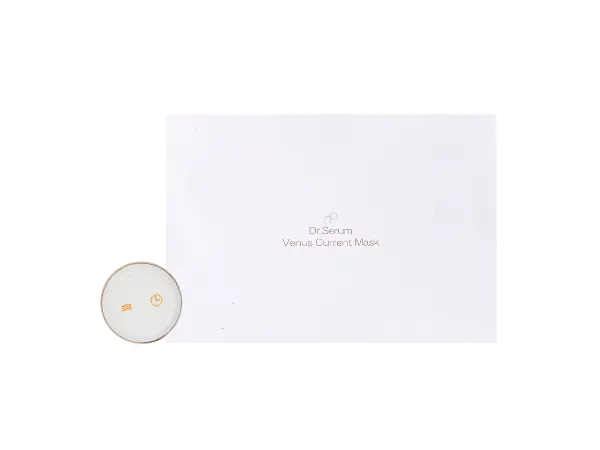 Dr.Serum Venus Current Mask 白色盒裝與圓形控制器。使用時先將幹細胞精華浸透面膜，再將蜂窩狀印花一面貼於面部